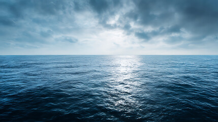 Wide seascape with horizon and cloudy blue sky – ocean background for design and presentation
