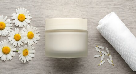Elegant skincare product presentation with chamomile and soft towel touch