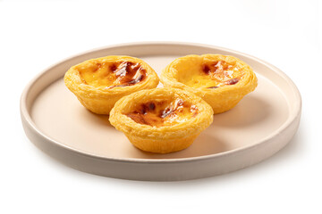 Tradition egg tart on ceramic plate on white background.
