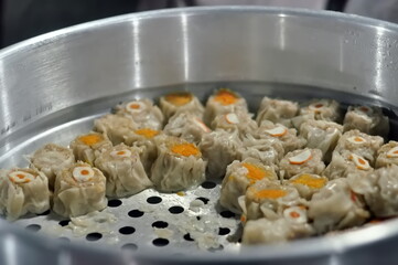 cooking dinsum with vegetables