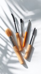 Makeup brushes and cosmetics overhead view