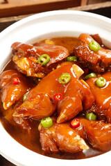 Gourmet Braised Pork Trotters with Chili - Traditional Asian Delicacy in Savory Marinated Sauce