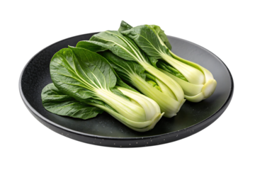 leafy green vegetables with black ceramic plate fresh serving