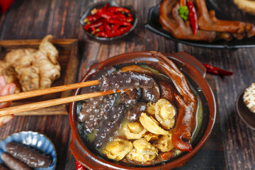 Authentic Asian Mushroom Soup in Traditional Bowl with Chopsticks on Wooden Table