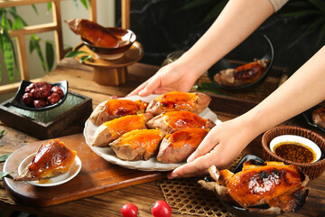 Traditional Baked Sweet Potatoes from Shandong Province China Served on Wooden Table with Tea