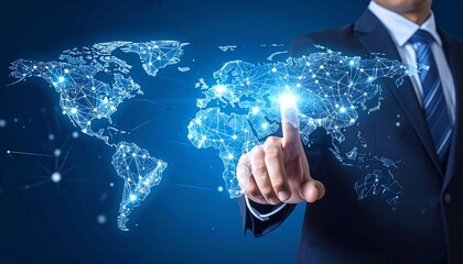 A suited person's hand points to a glowing, interconnected world map. Modern blue digital display shows networks