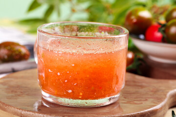 Fresh Tomato Juice with Heirloom Tomatoes on Wooden Board - Healthy Organic Drink and Farm Produce