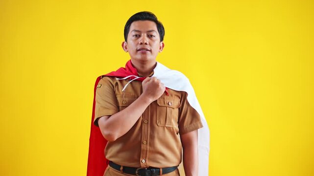Proud Indonesian man honoring independence day with the red and white flag draped over his shoulders