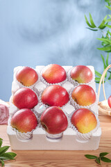 Red Apples in Heart Display Foam Packaging Fresh Fruit Showcase on Wood Table
