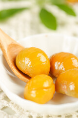 Glazed Alpine Chestnuts in Wooden Spoon - Traditional Healthy Fruit Snack Food