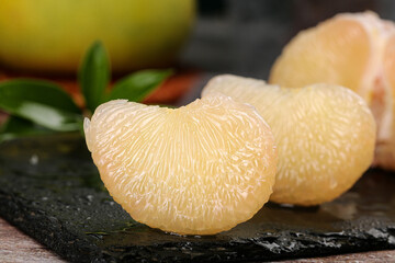 Freshly Picked Sweet Pomelo Duo - Juicy Citrus Segments on Slate Board
