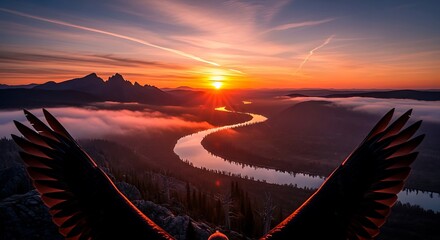 Eagle soaring over misty river valley during a vivid golden sunset