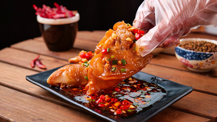 Gourmet Pork Trotters with Secret Sauce - Chef Preparing Traditional Chinese Delicacy Dish
