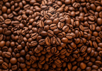 Fototapeta premium Closeup Roasted Coffee Beans Macro Texture and Aroma, Freshly Brewed Coffee Background.