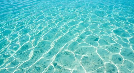 Serene tropical paradise concept with shimmering sunlight reflecting on crystal clear turquoise water over a sandy seabed