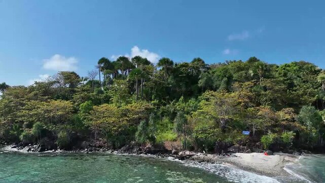 
Aerial video of the beautiful landscape of Kunyit Matasirih Island with crashing waves and blue sea water that is very pleasing to the eye, this island is located in Pulau Sembilan District.