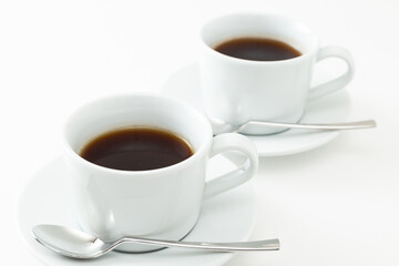 カップに入ったコーヒー　白バック