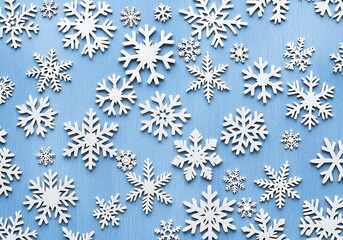 Fototapeta premium White Snowflakes on Blue Background - Winter Season Design