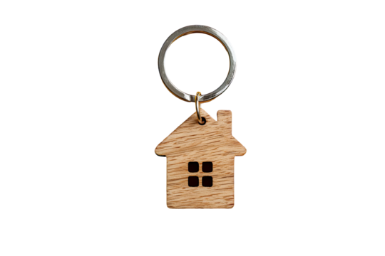 Close-up of a wooden house-shaped keychain.  A simple, light-brown wooden house silhouette hangs from a metallic ring