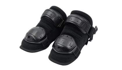 Black protective gear, possibly knee pads.  Close-up, studio shot