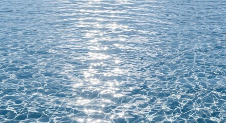 Obraz premium Sunlight reflecting on the surface of clear water, creating a shimmering effect and calming textures