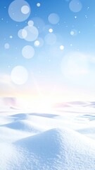 Bright, airy, winter landscape with snow drifts under a pale blue sky with bokeh and sun flair evokes quiet winter day