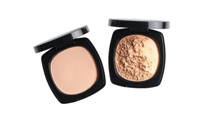Two open powder compact cases
