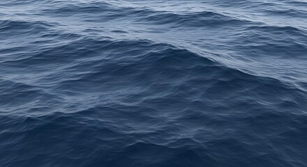 Fototapeta premium A captivating view of the deep blue sea, with gentle waves creating a tranquil and mesmerizing water surface pattern