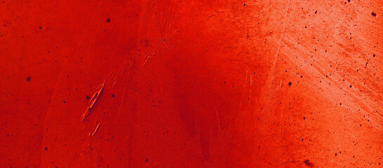 Closeup of a red surface with minor imperfections. Suitable for backgrounds, textures, or design elements for various projects. Great for artistic and creative concepts.