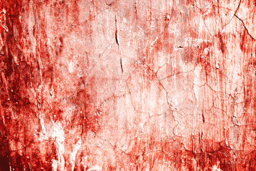 Cracked wall with red texture suitable for backgrounds in design work, abstract concepts, or architectural themes with a distressed look.