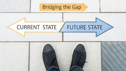 Bridging the Gap Between Current State and Future State with Arrows and Feet on Paved Surface