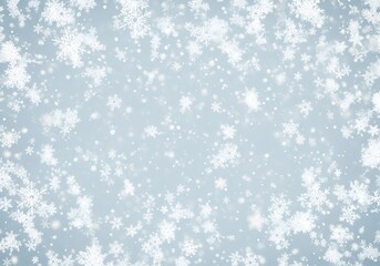 Soft focus background of falling snowflakes in varying sizes and shapes, creating a magical and serene winter atmosphere with a gentle blue and white color palette, perfect for holiday and seasonal th