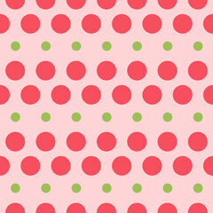Red and green polka dots on pink background pattern