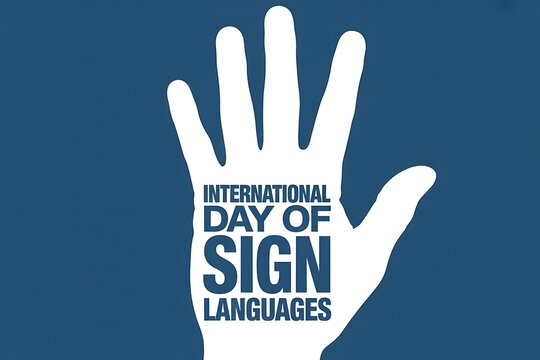 International Day of Sign Languages celebrated with a white hand against a blue backdrop