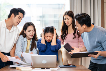 Business woman at work on a laptop in her office for a deadline. Stress, multitask and an overwhelmed. burnout or anxiety with a young female employee feeling pressure from a busy schedule.