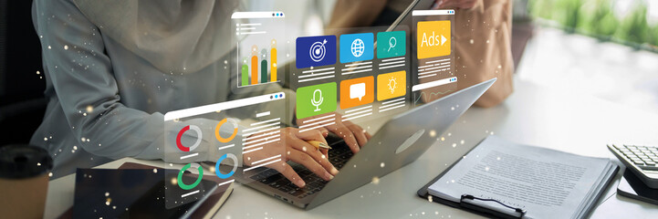 Asian Businesswoman Using Laptop Computer for Digital Marketing Strategy Online Advertising and...