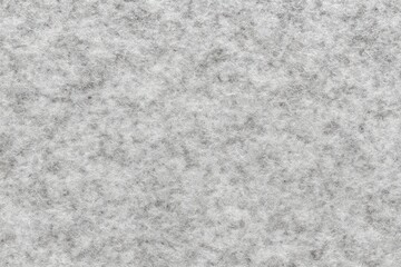 Fototapeta premium Light gray, textured surface with subtle variations in tone