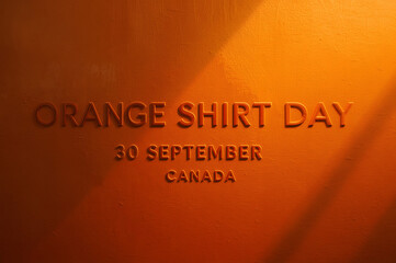 Orange Shirt Day" - 3D Text on an Orange Background for September 30 in Canada