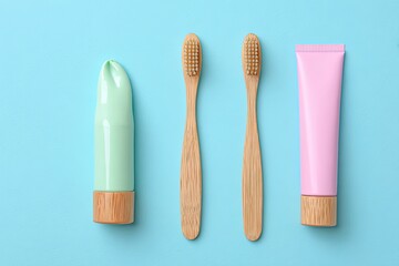 Obraz premium Toothbrush and toothpaste on a light blue background