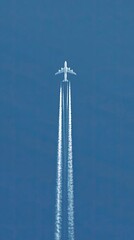 Airplane contrails in a blue sky