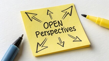 Open Perspectives Concept on Sticky Note Surrounded by Arrows on White Background with Pens in Background