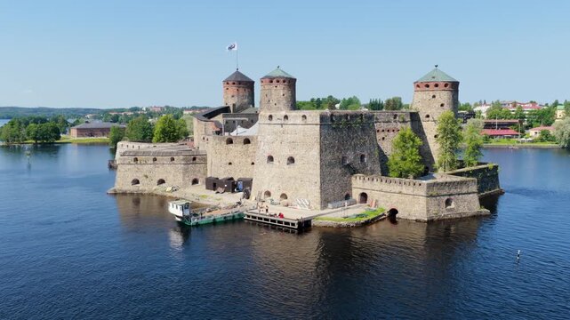 Aerial view in front of the Sankt Olofsborg castle, summer in Savonlinna, Finland