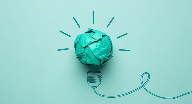 Brainstorming new ideas with crumpled paper bulb