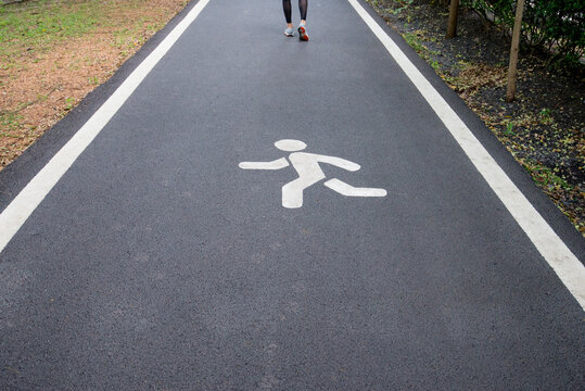 Pedestrian sign on the road in the park,