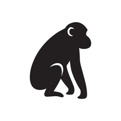 Black silhouette of a monkey sitting down isolated on white background