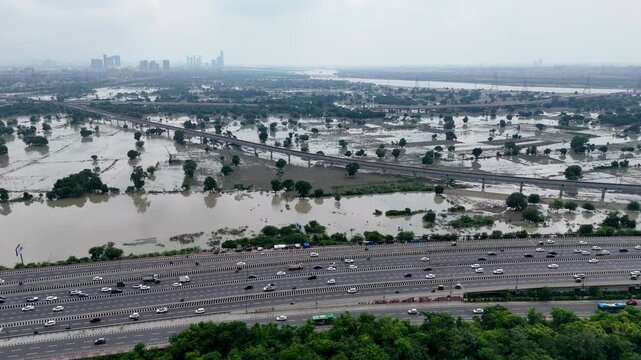 Aerial view of Flood area near Yamuna River in Delhi and Busy Delhi-Meerut highways
