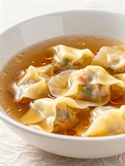 Close-up of Delicate Wontons in Savory Broth