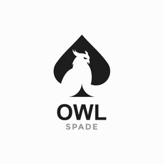 owl and spade in negative space logo