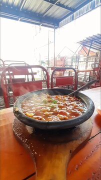 Hot boiling Indonesian spicy food called Sambel Gami.