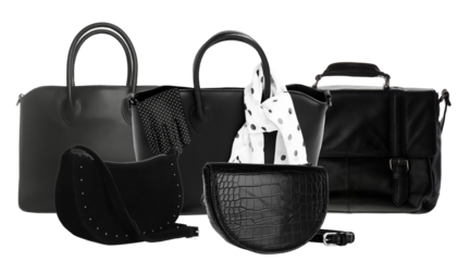 selection of black handbags and purses on a surface